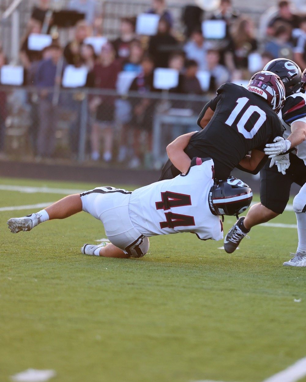 Evan Karl, #44, wrapping up a ball carrier